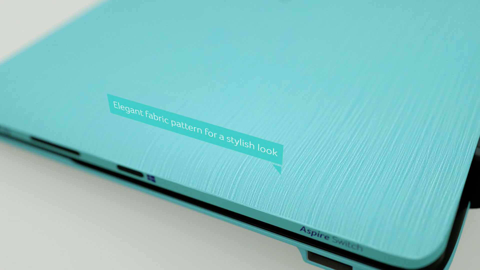 Macro pass across the brushed-fabric turquoise lid